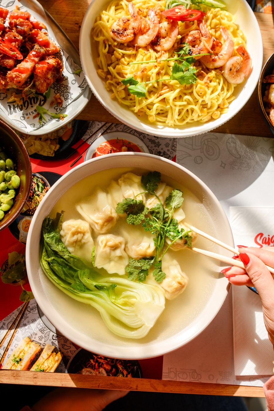 Wonton soup and sharing plates on the Saigon table